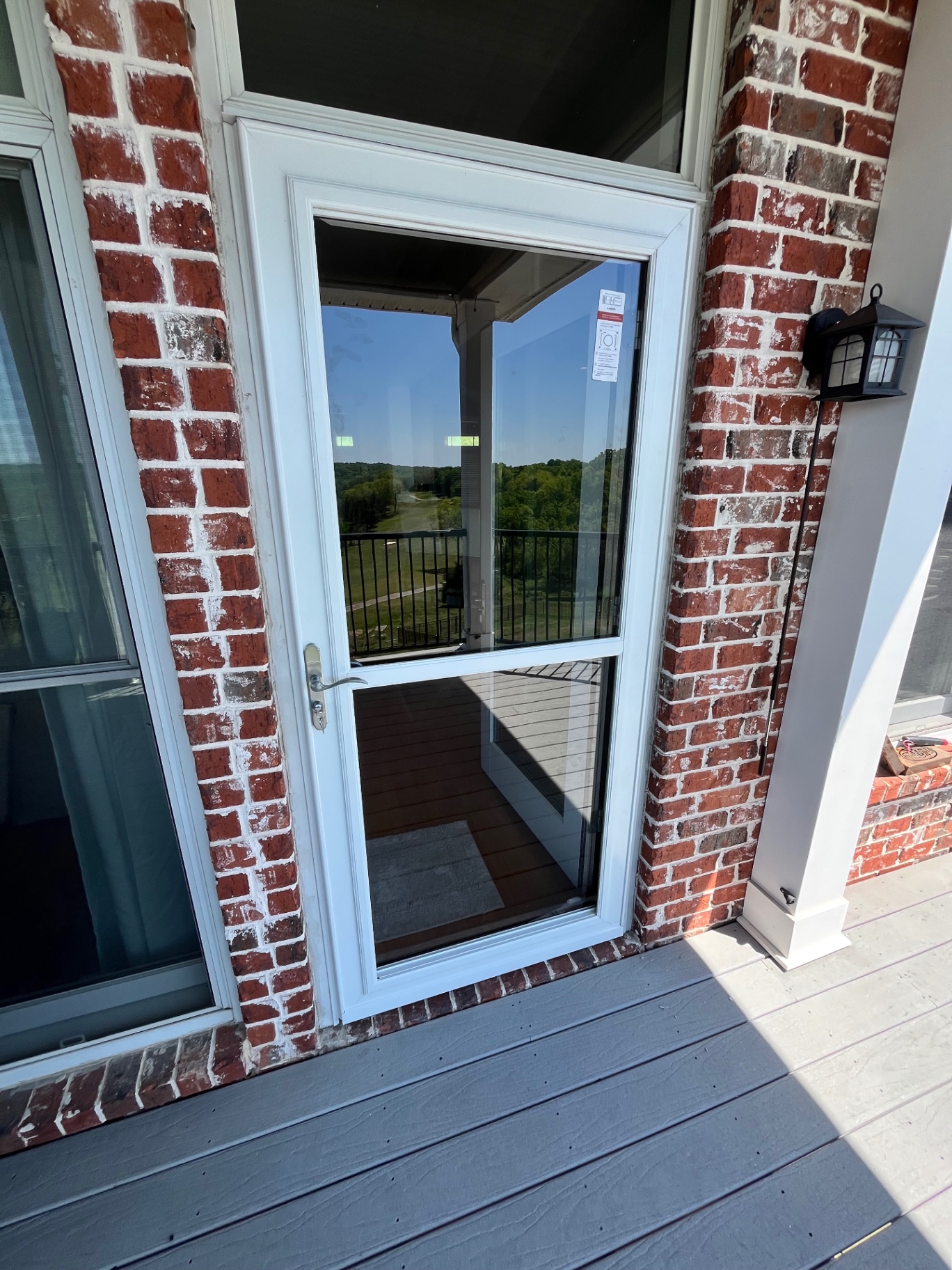 Storm door install on brick