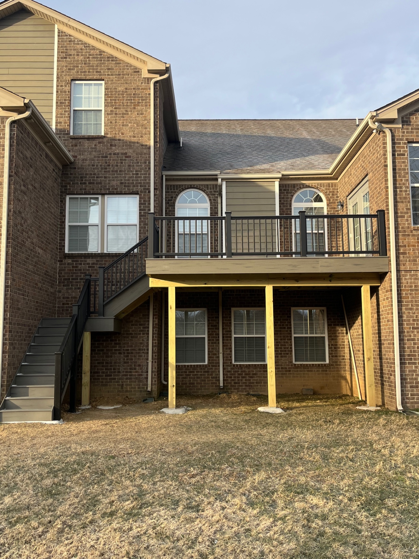 Elevated deck with black aluminum rails