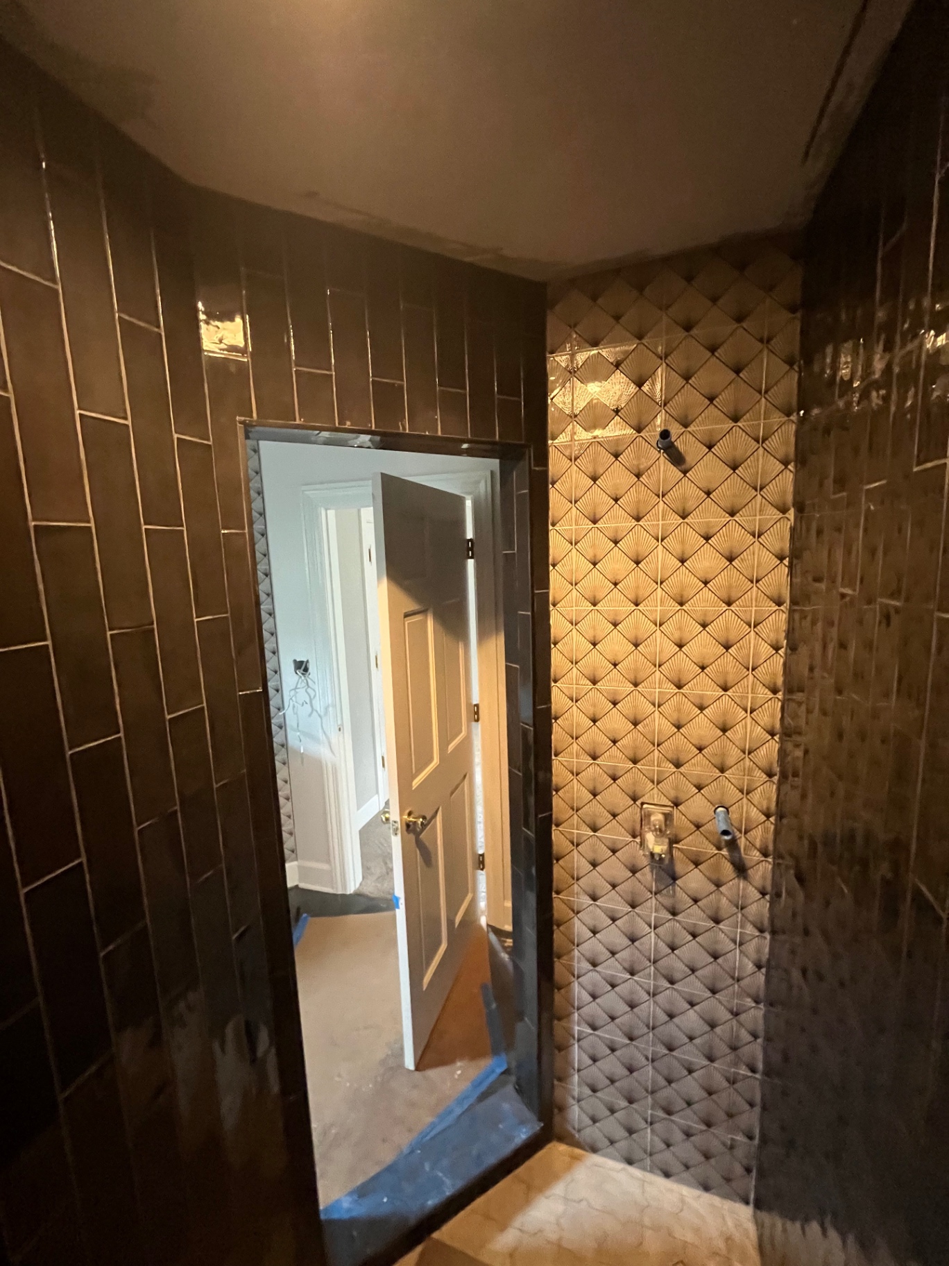Art-deco fan tile shower in progress