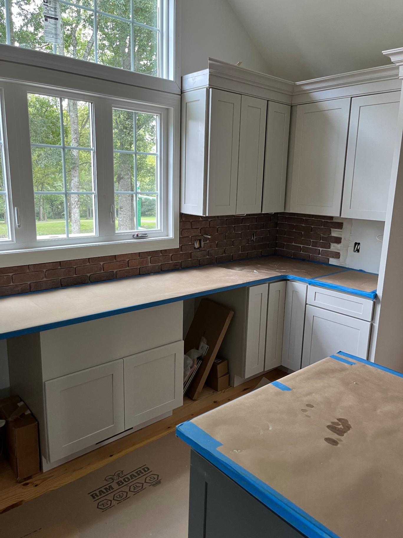 Classic red brick backsplash install