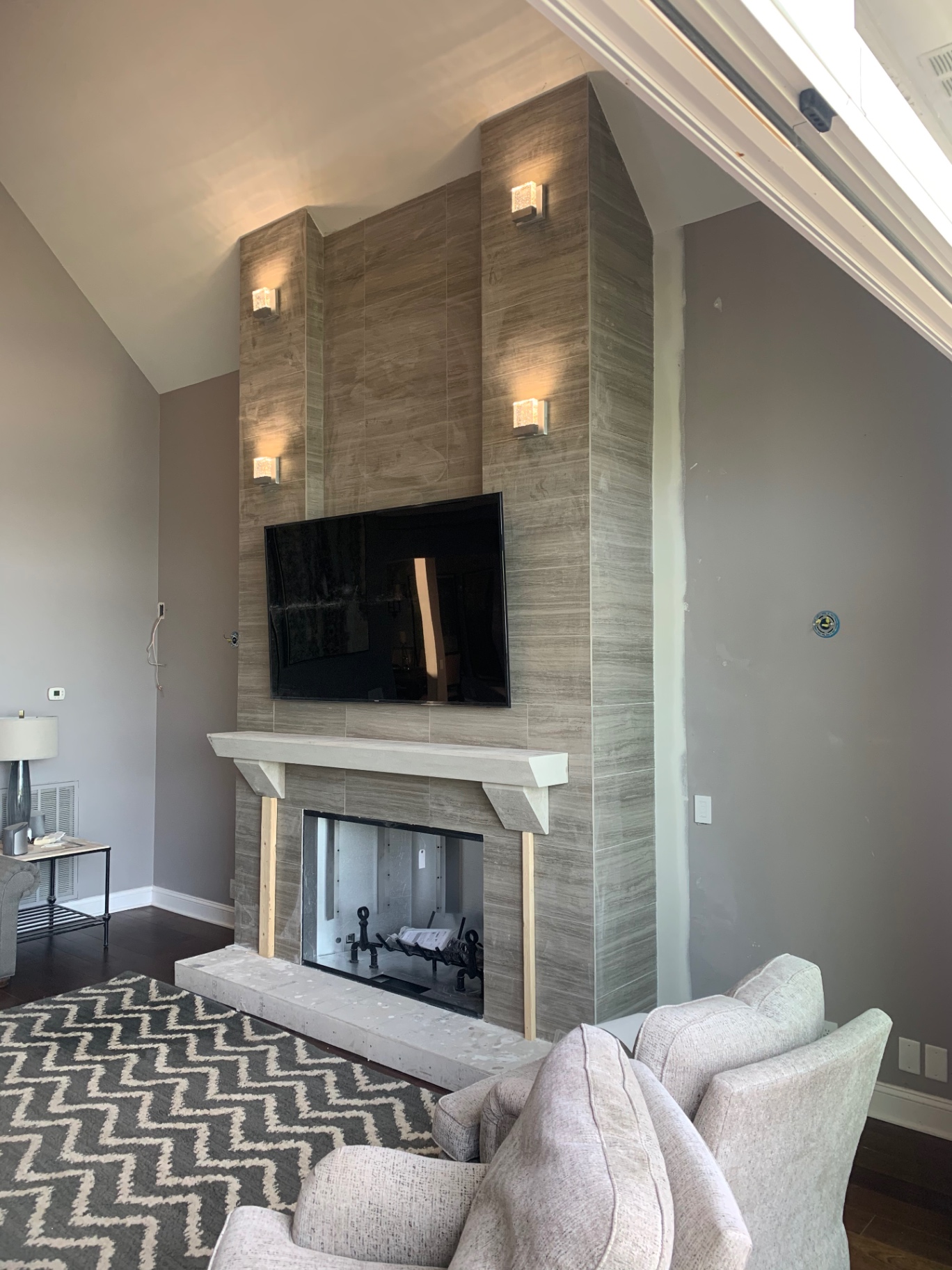 Modern tile fireplace with TV surround